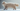 LaPerm Cat with Feline Fancy Logo.