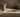 Oriental Short Hair Laying Down with Feline Fancy logo.