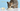 Cat eating eggs with Feline Fancy Logo.
