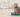 Cat using litter tray with Feline Fancy Logo.