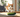 Cat scared of Cucumber with Feline Fancy Logo