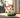 Cat scared of Cucumber with Feline Fancy Logo