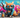 A colorful, street-art-style mural featuring a cool tabby cat wearing sunglasses and a hoodie, spray-painting the words "250 Tabby Cat Names" in bold