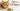 White background with a ginger cat looking at a spoonful of honey, clean minimalist style, centered bold text "Can Cats Eat Honey?