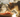 cat eating pork with Feline Fancy Logo.