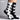 Stylish black-and-white cat-themed socks featuring whisker and ear designs