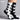 Stylish black-and-white cat-themed socks featuring whisker and ear designs