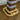 Cat scratching post with striped design on a wooden floor