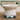 Ceramic pet bowl with mountain design on a wooden surface