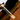 Close-up of a brown leather handbag with gold zipper pull.