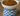 White bowl with blue checkered base filled with dog food on a wooden surface