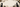 Decorative banner with black cats, gift boxes, and decorative elements on a beige background