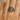 Silver ring with blue stones on a finger against a neutral background