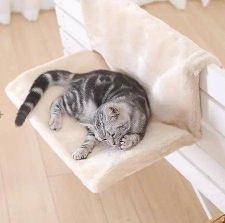 Radiator Cat Bed designed to hang on your radiator, providing a warm and cozy spot for your cat to relax during colder months