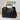 Black handbag with gold handles on a white surface, branded 'Feline Fancy'.