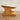 Wooden pet step platform on a wooden floor with 'Feline Fancy' branding.