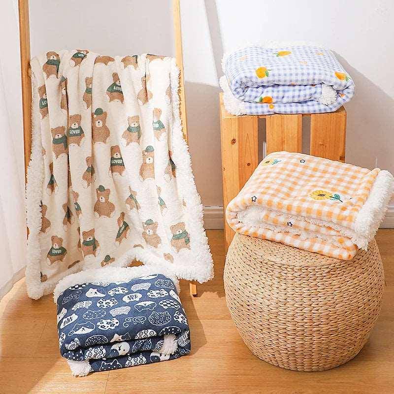 The Cat Print Blanket combines comfort and charm, offering a soft, plush fabric to keep you warm and cozy