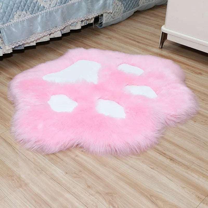 Add a playful touch to your space with the fun and cozy Cat Paw Rug