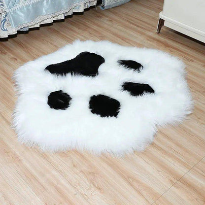 Crafted with high-quality, soft materials, the Cat Paw Rug offers both durability and coziness