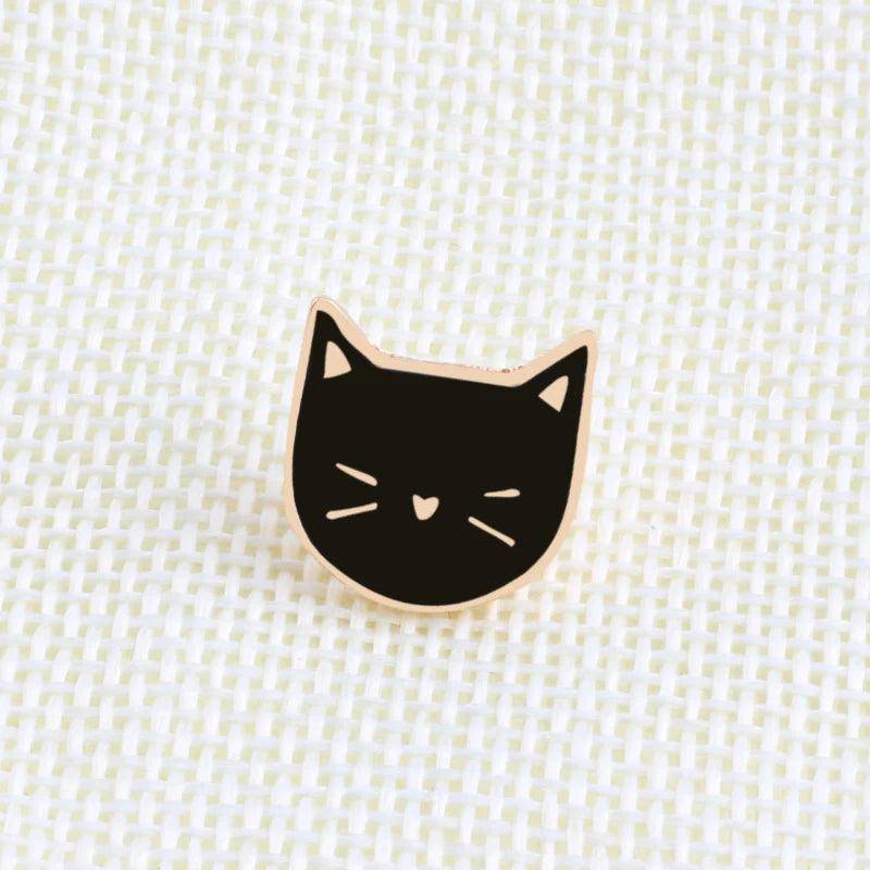 Lightweight Black Cat Enamel Badge with a secure pin backing.