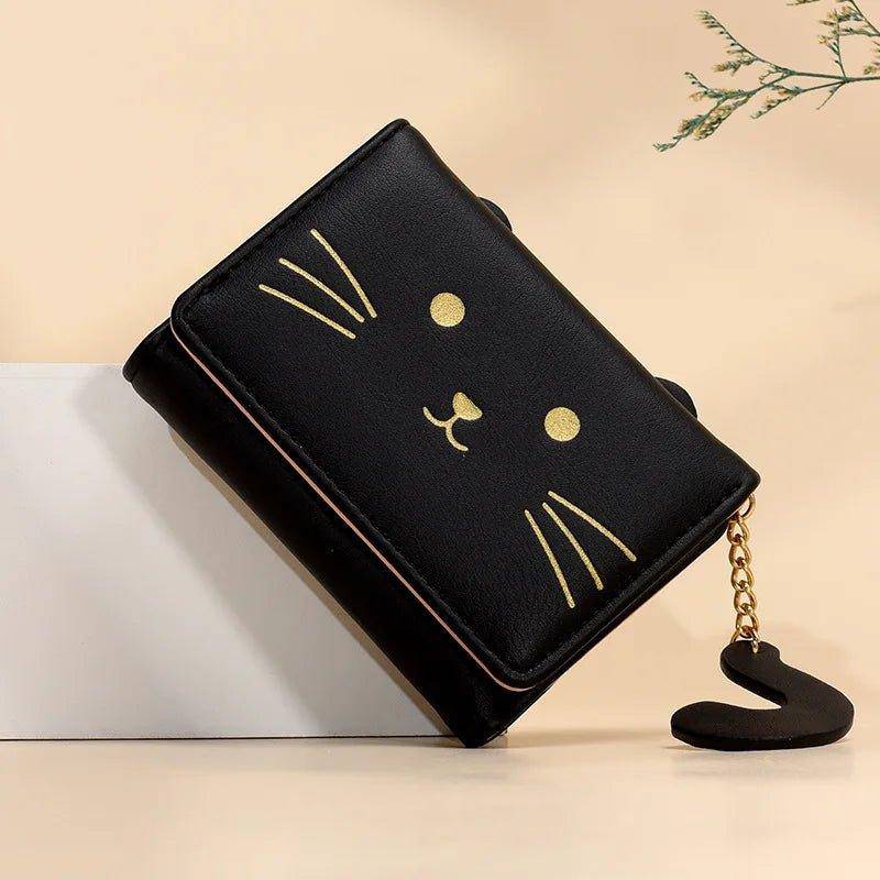 Add a fun and unique element to your outfit with the charming Cat Face Purse