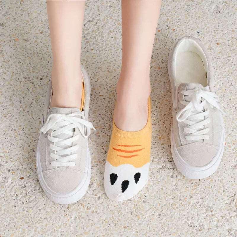 Add a touch of charm to your sock collection with these cozy and whimsical Cat Paw Socks