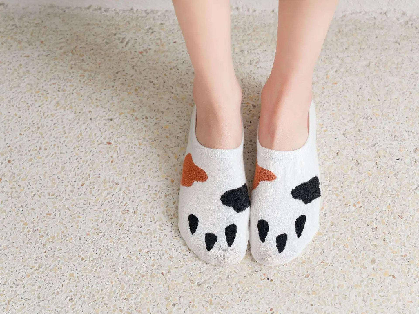 Show your love for felines with these cute and practical Cat Paw Socks, ideal for casual wear or as a gift