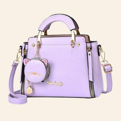 Kitty Charm Handbag designed to showcase your love for cats while providing ample space for your essentials