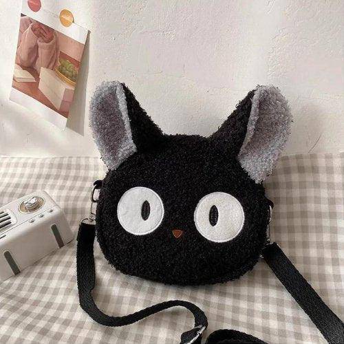 Plush Cat Bag featuring a soft, cuddly design with a cute cat face, perfect for adding a fun and cozy touch to your accessories