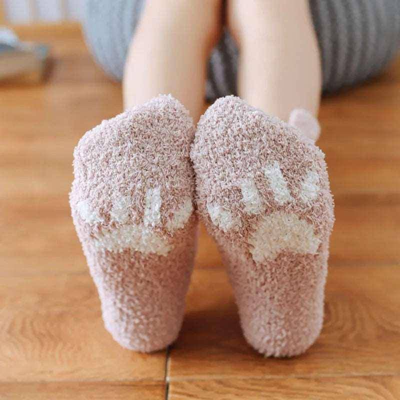 The Fluffy Cat Socks combine comfort and charm, offering a soft, plush material for ultimate coziness