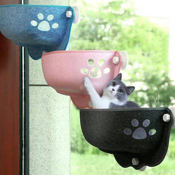 Elegant Kitty Window Hammock designed to give your cat a cozy resting spot.