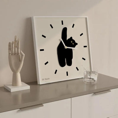 Charming Black Cat Wall Clock, perfect for adding a playful touch to any room.