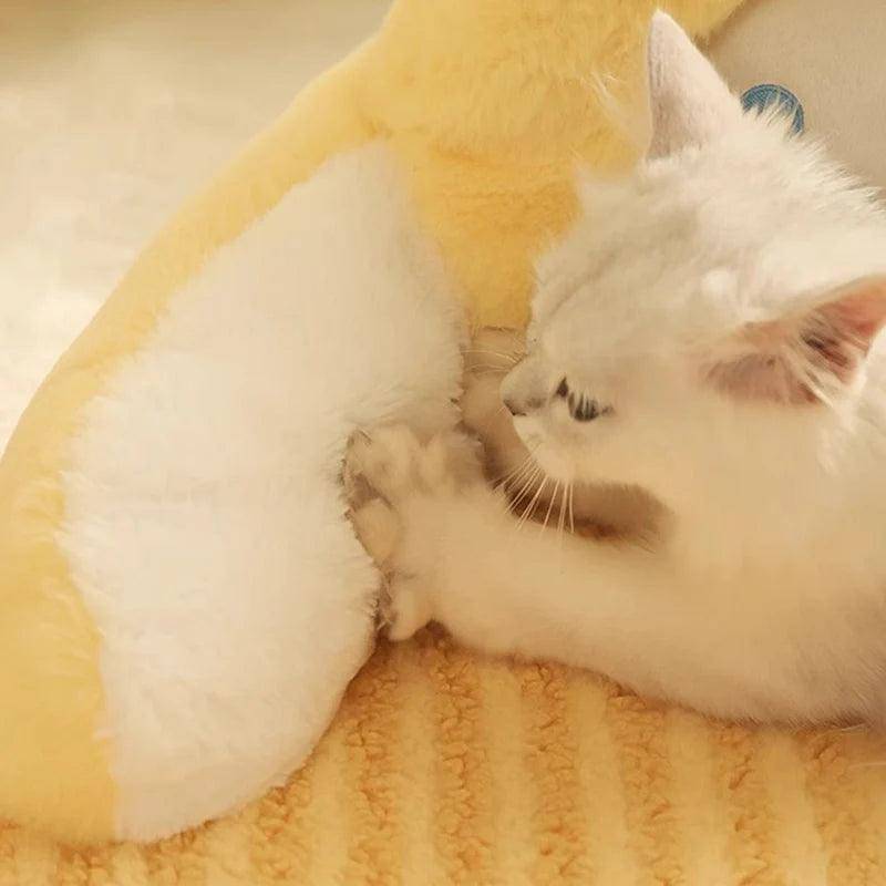 Add a playful touch to your cat's nap time with the Cute Cat Bed, designed for comfort and style