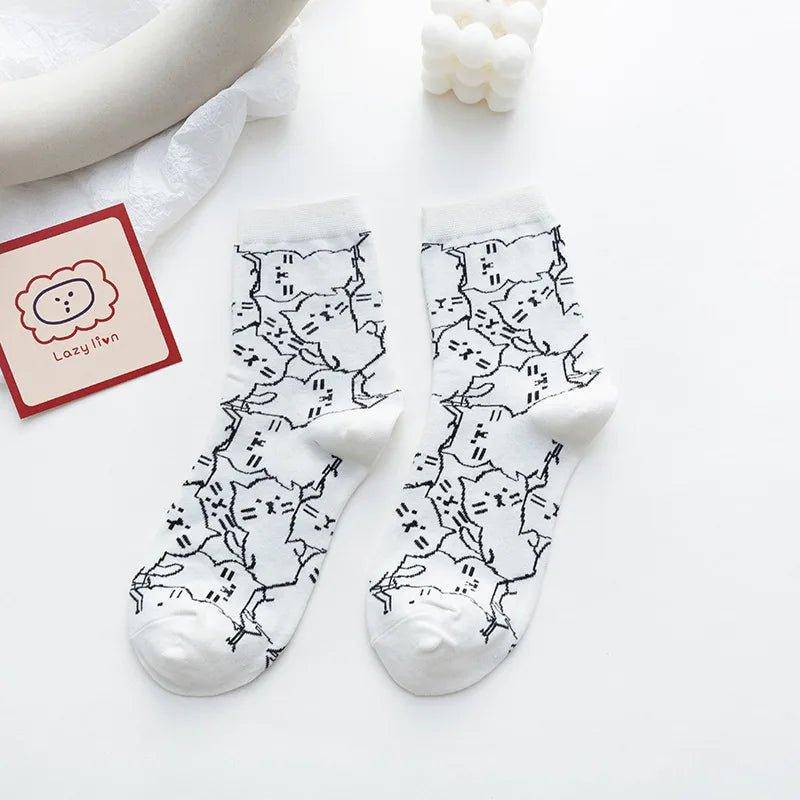 Crafted with soft, breathable materials, the Kawaii Cat Socks provide warmth and comfort throughout the day