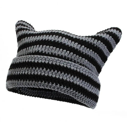 Snuggle Cat Hat designed to bring personality and warmth to your wardrobe with its adorable cat ears and soft fabric