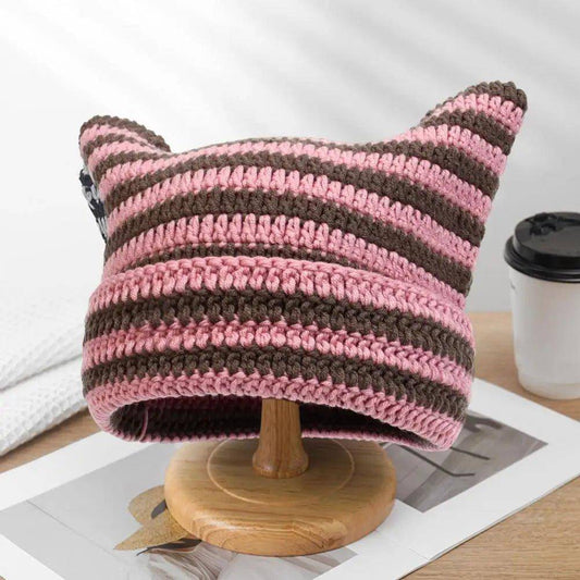 Snuggle Cat Hat featuring an adorable design with cat ears, perfect for staying cozy and stylish during colder months