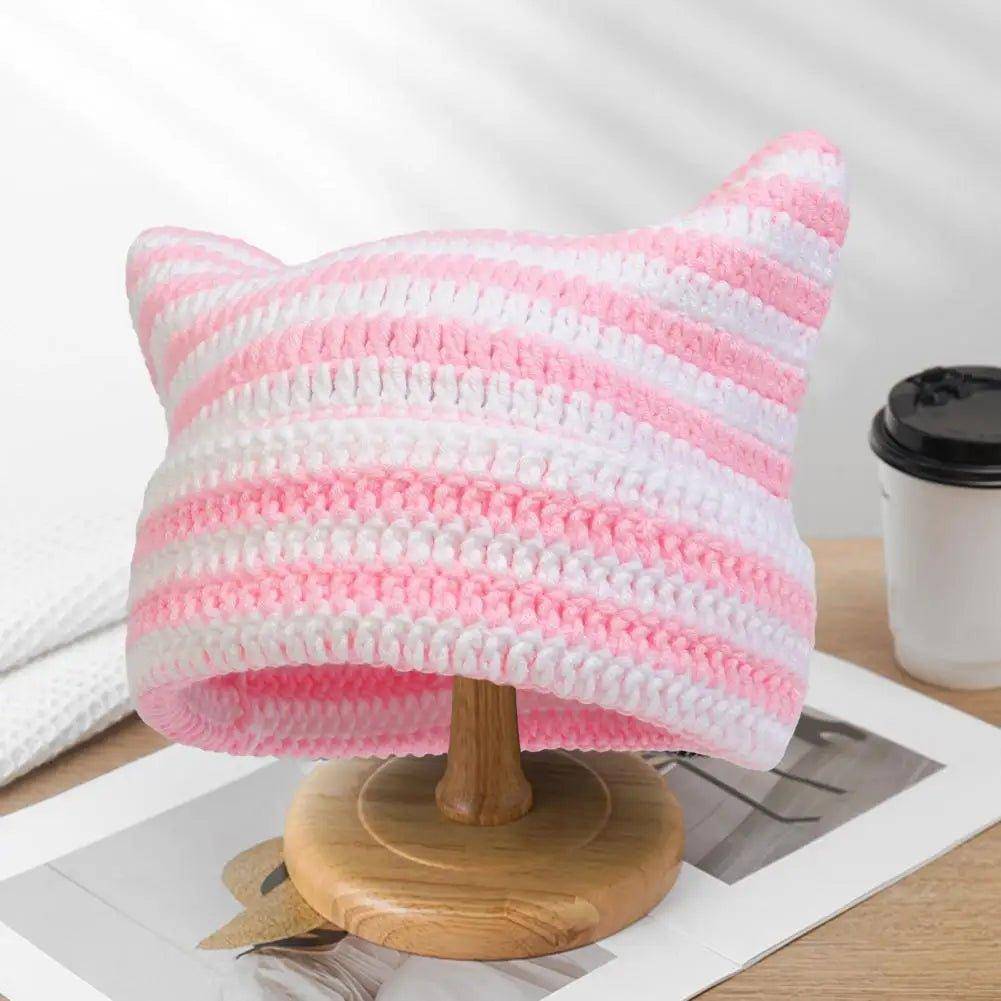 Add a touch of whimsy and warmth to your winter wardrobe with the charming Snuggle Cat Hat