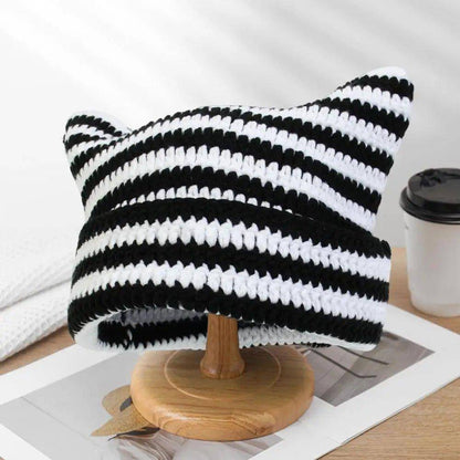 The Snuggle Cat Hat is designed to provide warmth and comfort while showcasing your love for felines in a cute, fashionable way