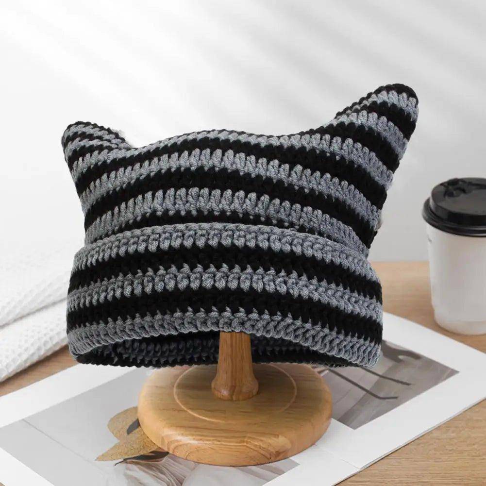 The Snuggle Cat Hat is perfect for those looking to add a cute, feline-inspired accessory to their cold-weather wardrobe