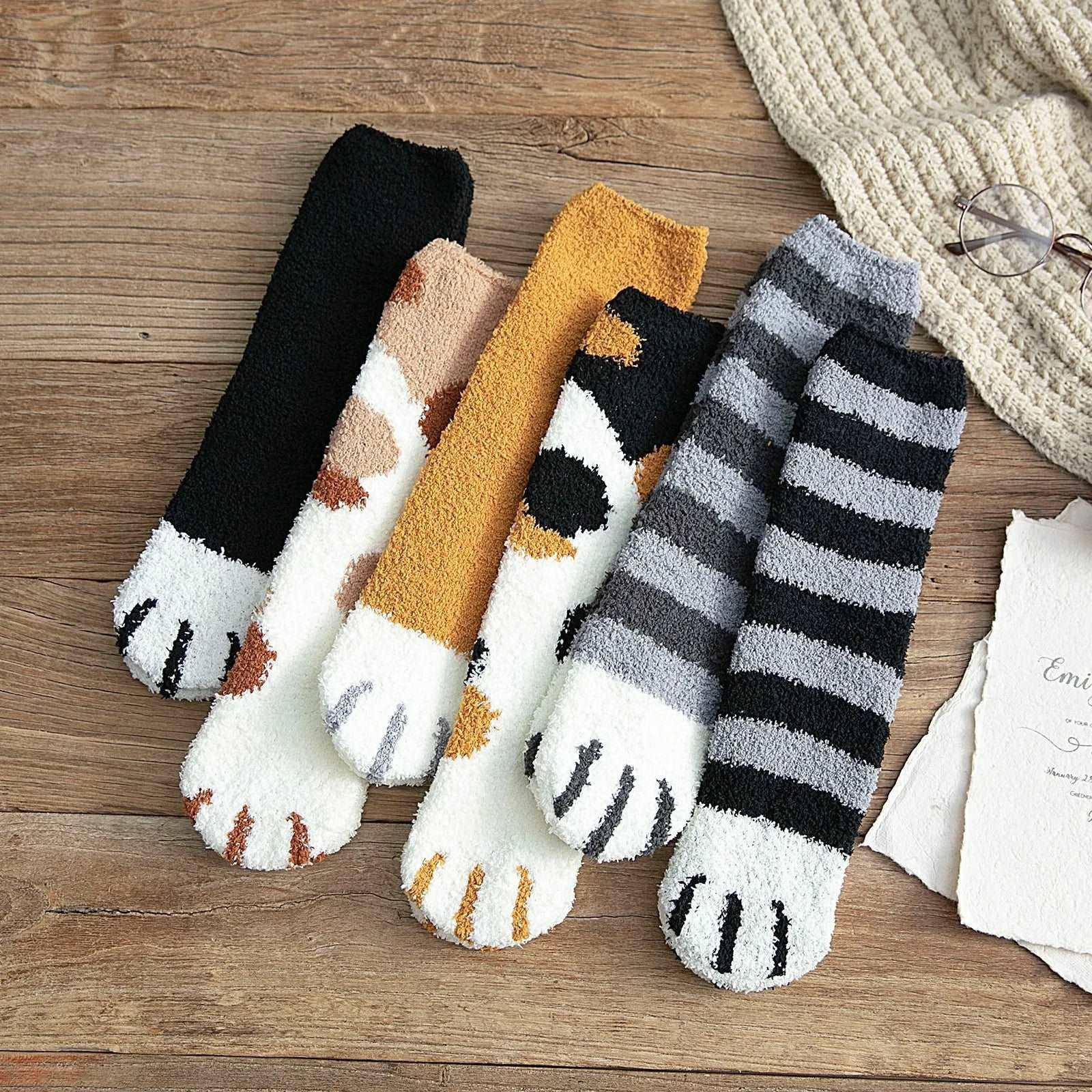 The Cat Paw Socks combine comfort with a charming paw print design, ideal for everyday wear