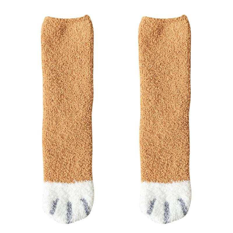 Perfect for lounging at home or adding a quirky touch to your outfit, the Cat Paw Socks are both cute and functional