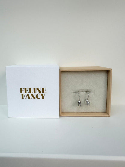 Add a touch of sophistication to your jewelry collection with these Audrey Cat Earrings