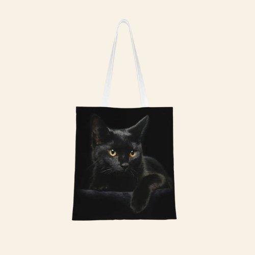 Crafted with high-quality materials, the Black Cat Bag offers durability and practicality while maintaining a stylish, cat-inspired look