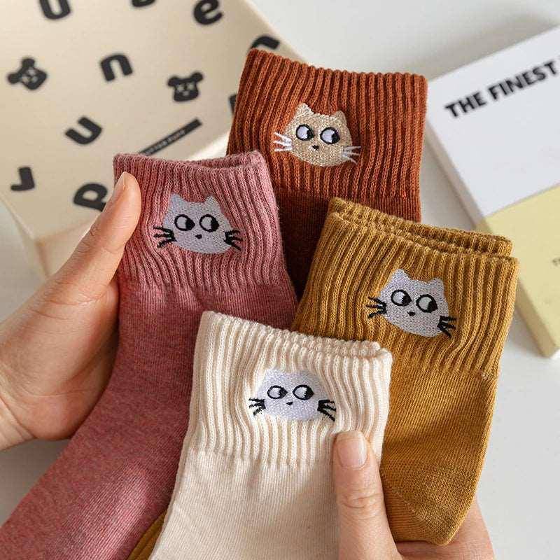 The Funny Cat Socks combine comfort with playful cat-themed motifs for a lighthearted touch to your outfits