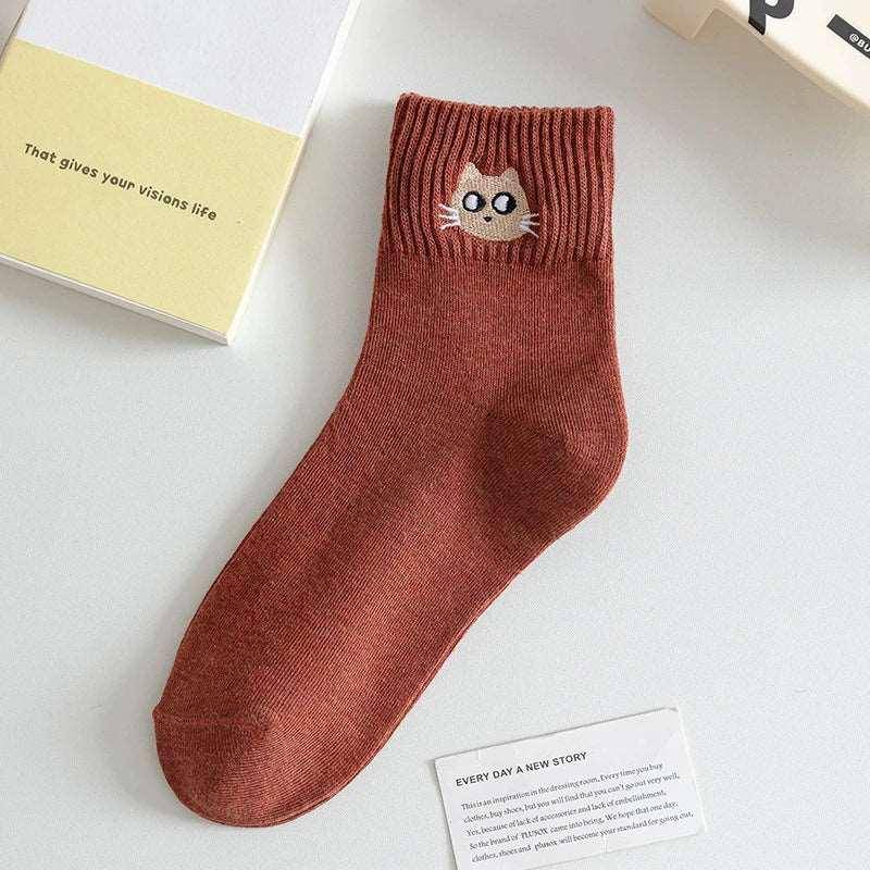 Show off your sense of humor and love for cats with these playful and comfy Funny Cat Socks