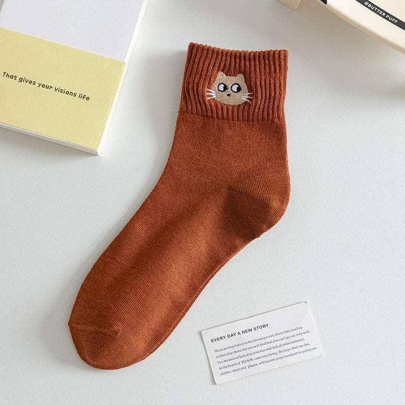 The Funny Cat Socks are the perfect accessory to bring a smile to your face and warmth to your feet