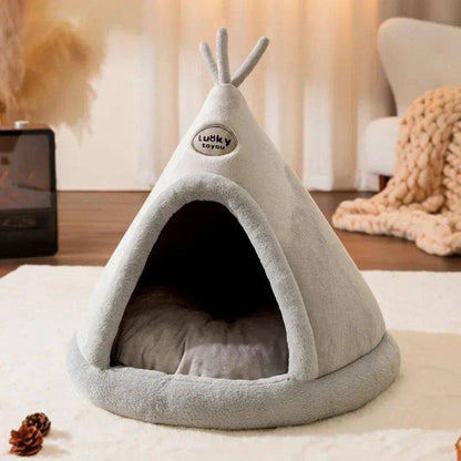 The Teepee Cat Bed combines a soft, cushioned interior with a durable, fabric exterior, creating a comfortable hideaway for your cat