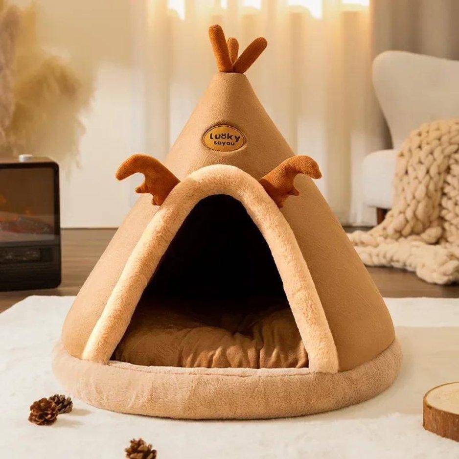 Crafted with high-quality materials, the Teepee Cat Bed offers a cozy retreat for your feline friend while adding a modern, playful look to your home