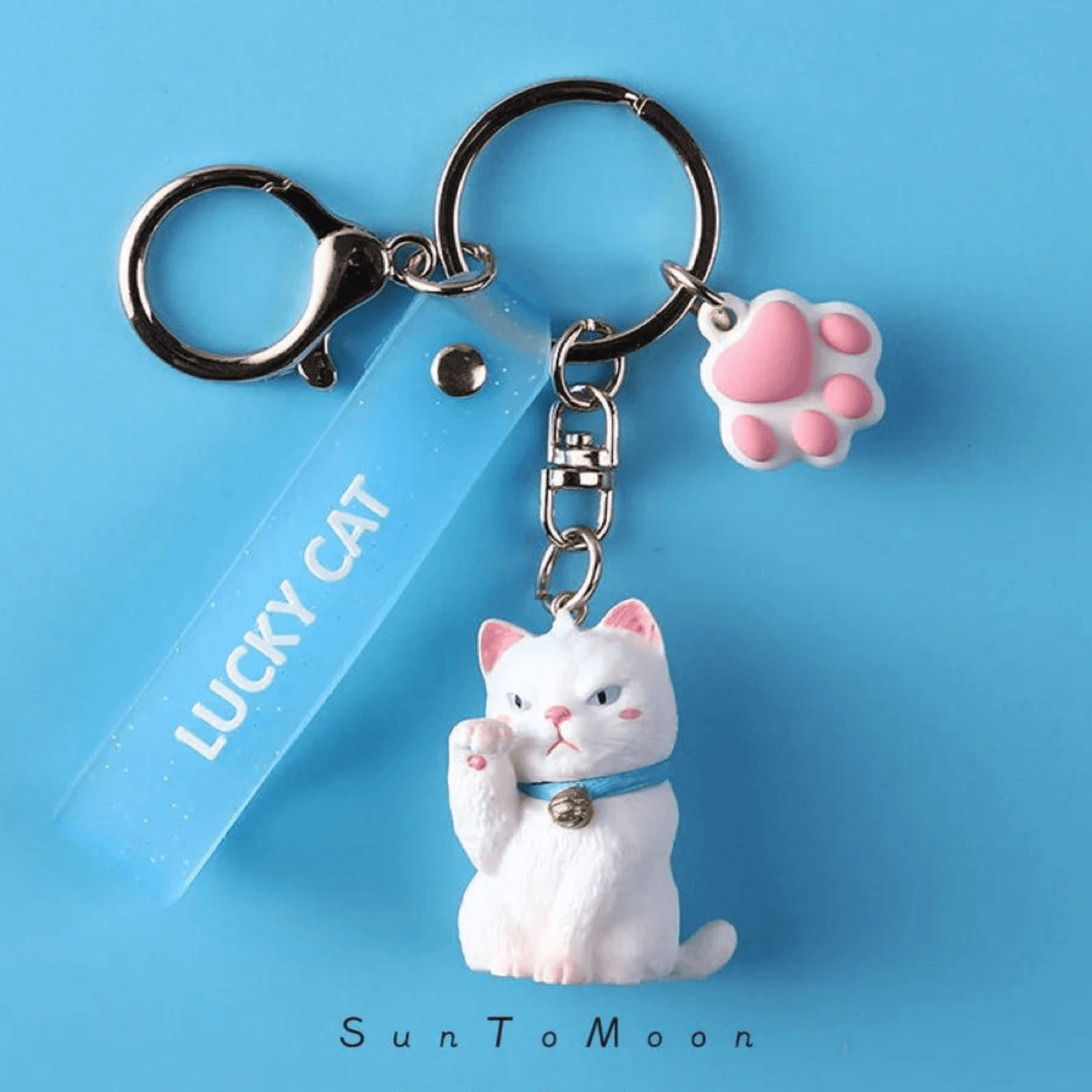 Elegant White Cat Keychain featuring a sleek cat design.