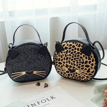 Add a touch of personality to your accessories with the playful and expressive Cattitude Cat Bag